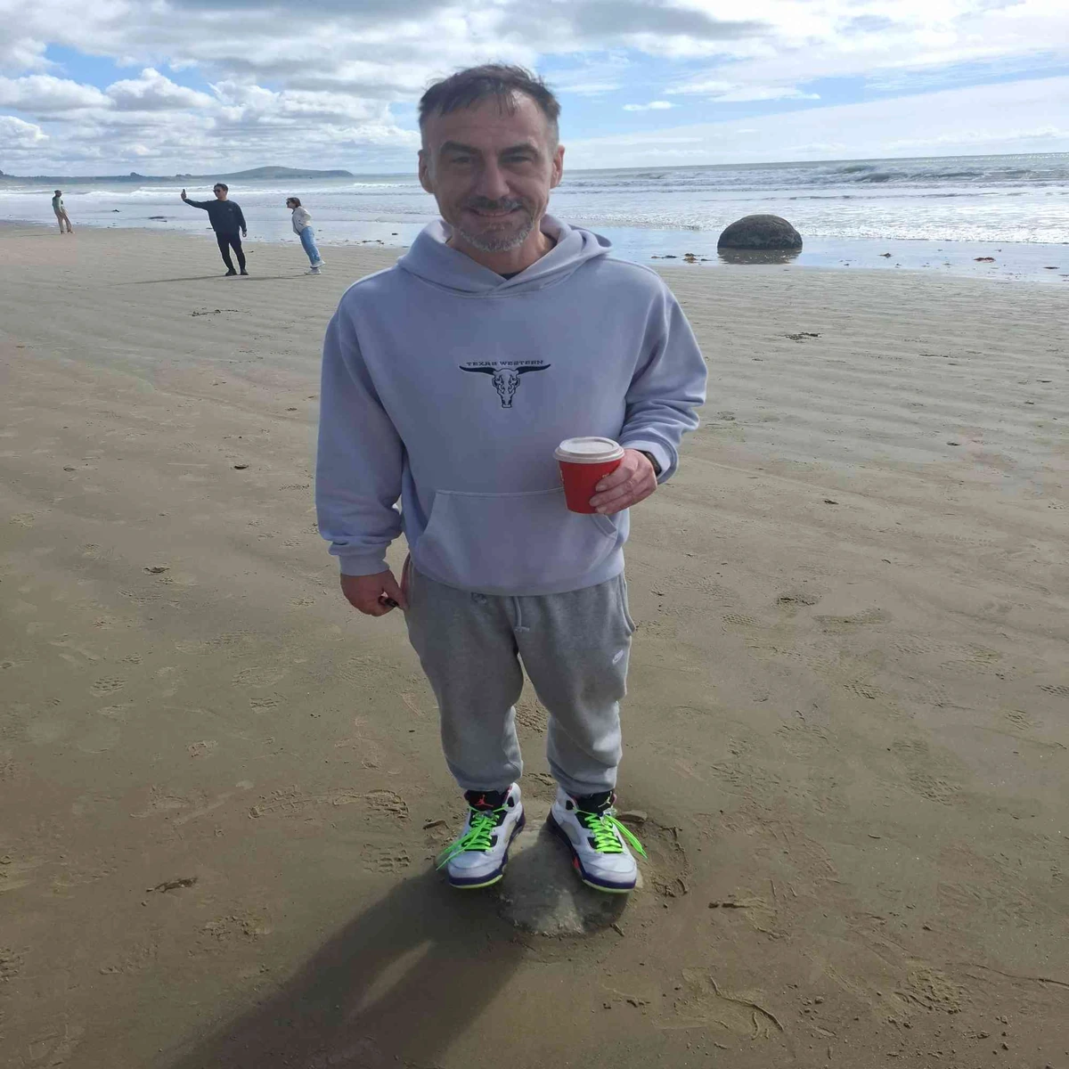 A member of the Barking Mad family enjoying a Wellington beach
